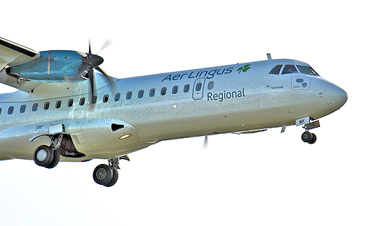 Aer Lingus prop plane coming into land at East Midlands Airport, UK