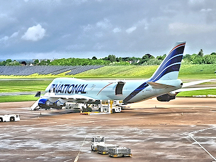 A National 747 aircraft being loaded at Birmingham Airport, UK